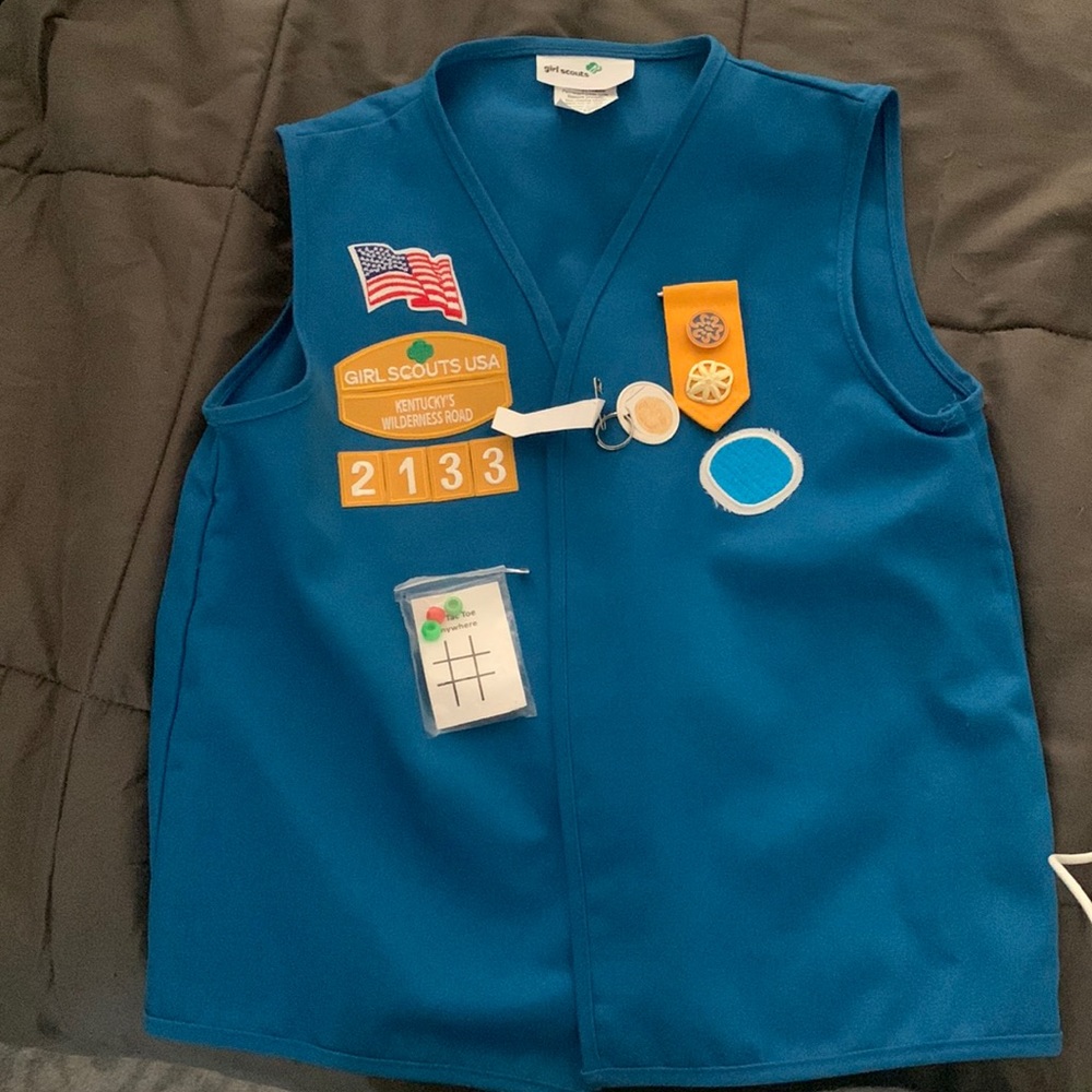Blue Daisy Girl Scout vest. Size small/medium.